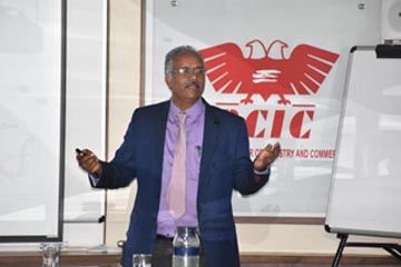 Dr Balamurugan delivering lecture on 