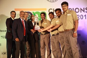 Dr Balamurugan presenting trophy to winners as jury of CII, Champions Trophy competition