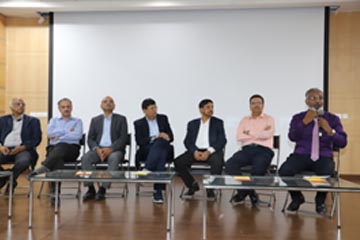 Dr Balamurugan leading a panel discussion at IIM, Sambalpur