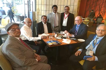 Samuel Sudhakar along with eminent speakers at the International Business Summit